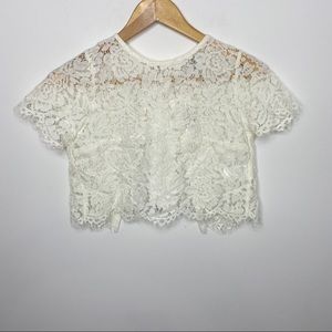 Maniju cream ivory lace crop top ribbon bow
Size XS
New with tags
